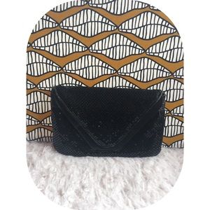 Black chain mail clutch with strap